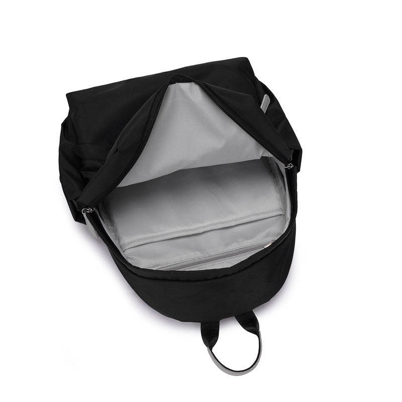 Spot al por mayor 2023 nueva mochila de tela Oxford para mujer coreana simple y versátil mochila para computadora de gran capacidad marea