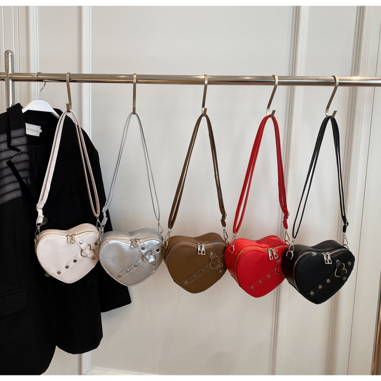 Internet celebridad personalizada de moda del todo-fósforo de color sólido en forma de corazón bolsa de costura bolsa de las mujeres nicho diseño crossbody hombro bolsa de las axilas