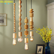 藍宸 北歐簡約現代實木餐廳吊燈創意個性藝術原木組合木藝燈飾