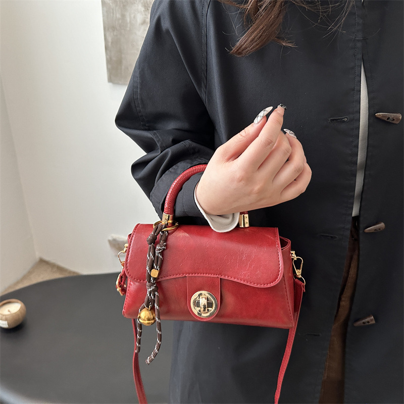 Retro simple bolso de mujer 2024 otoño invierno nuevo bolso de mano cuadrado de estilo exterior versátil alta textura mochila