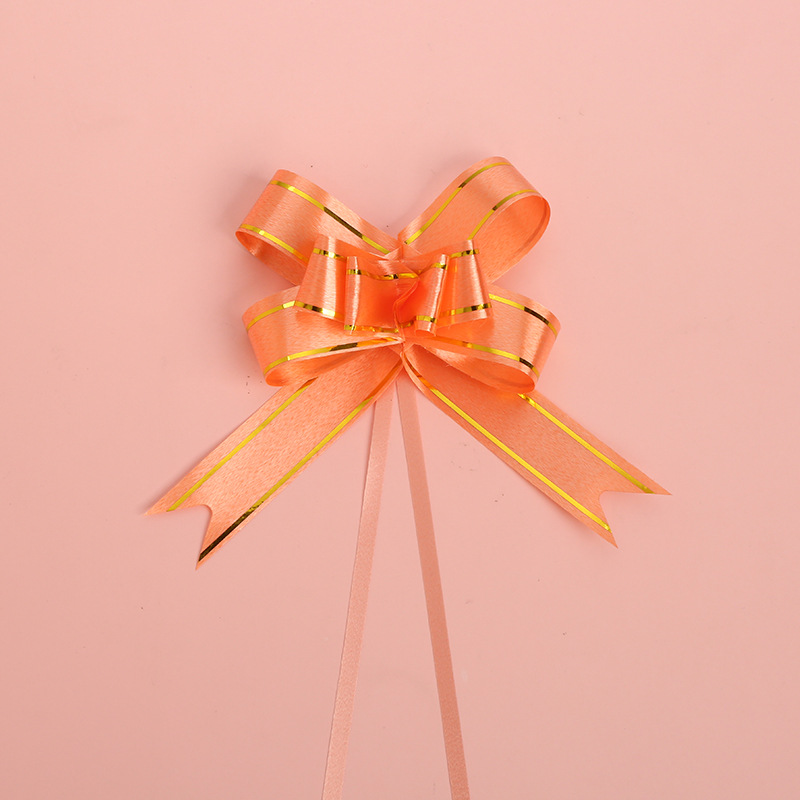 Borde dorado mano tire flor arco cinta regalo embalaje tire flor suministros de la sala de bodas boda decoración del coche de la boda tire Flor al por mayor