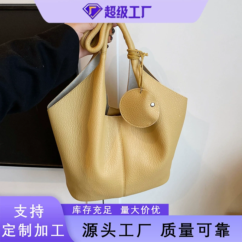 Летняя новинка 2025 года: портативная сумка-ведро для женщин, ретро-стиль, повседневная модная сумка через плечо, вместительная сумка для работы и повседневного использования.