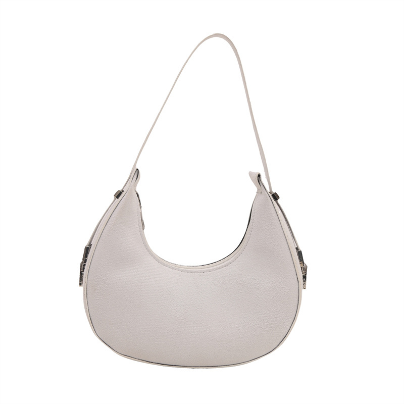 Bolsa de media luna francesa nicho para mujeres 2025 verano nuevo estilo de moda de color sólido esmerilado textura de moda bolso de hombro bolso debajo de la axila