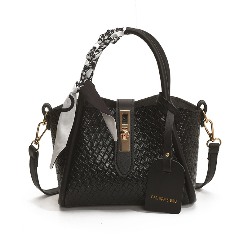 Bolsos Bolsos de moda femenina Bolsos de cubo de canasta de verduras 2025 nuevo bolso de hombro salvaje bolso de mensajero tejido extranjero