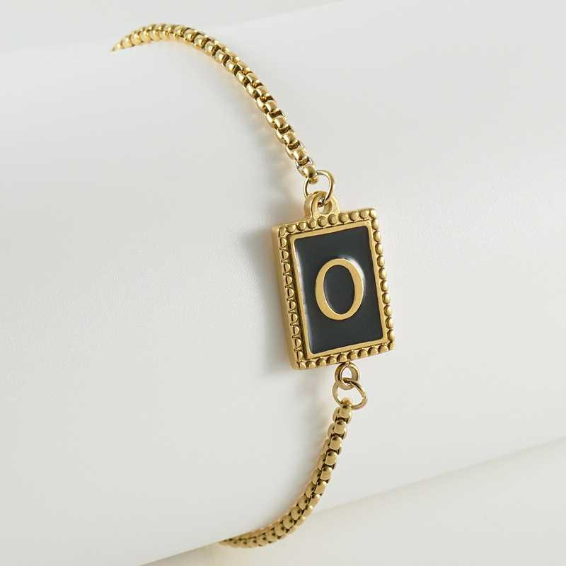 La moda europea y americana transfronteriza del acero inoxidable 26 pulsera inglesa de la letra en relieve pulsera Titanium de la cremallera del acero 18K de la frontera para las mujeres