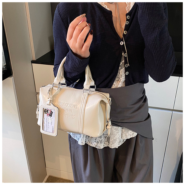 Korean version hand-held bowling bag for women 2025 new retro niche commuting pillow bag versatile single-shoulder crossbody bag undefined