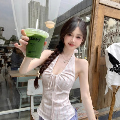 ピンクのvネックのストラップの首のベストの女性2025夏の新型の甘いギャルの小さい大衆の修身はやせている袖なしの上着を現します。