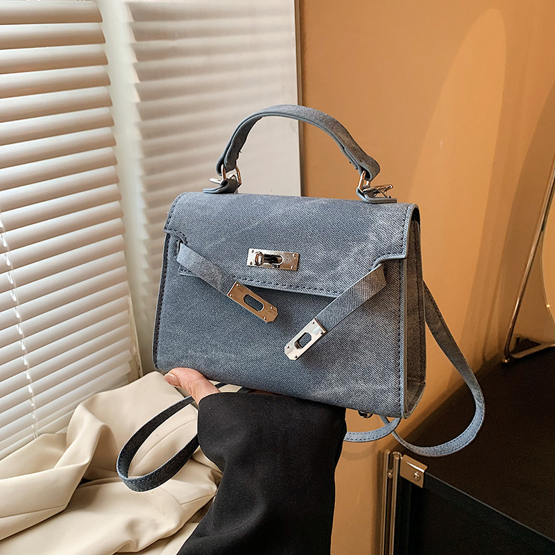 Bolsos de textura de moda bolsos de mujer 2024 otoño e invierno nuevo estilo retro esmerilado diseño de nicho bolso de mensajero de un solo hombro