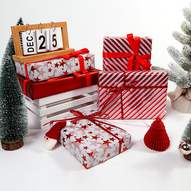 Transfronterizos para estrellas rojas estampadas de oro papel de embalaje de regalos de Navidad de lujo ligero papel de regalo de alto nivel DIY al por mayor
