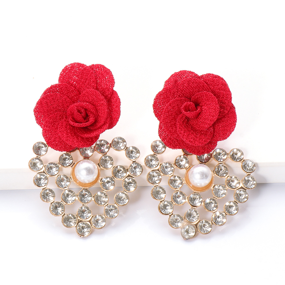 Fashion Geometric Heart-shaped Inlaid Rhinestone Flower Earrings display picture 1