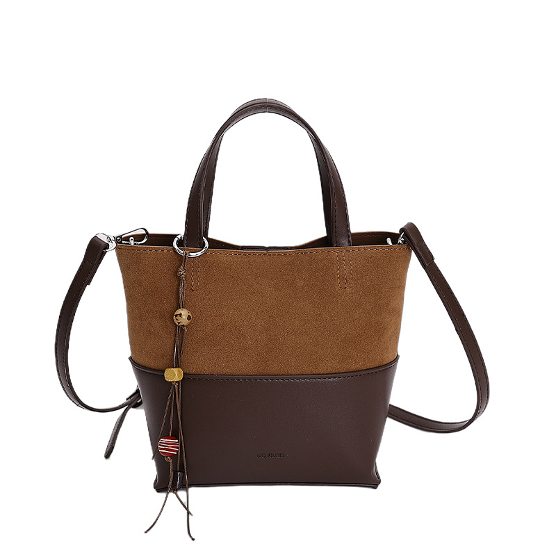 Bolso de moda transfronteriza retro bolso de cubo de agua mujer otoño y invierno 2025 nuevo estilo versátil bolso de hombro de viaje