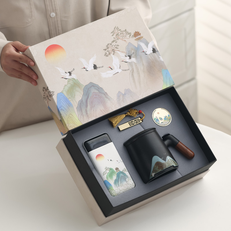 Taza de cerámica Jiangshan set de regalo de taza de marca de filtro de taza de agua de negocios de talla LOGO publicidad al por mayor