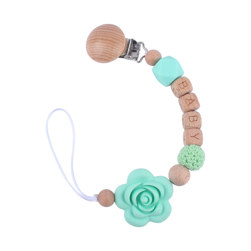 Nuevos suministros para bebés Beech chupete clip calmante bebé DIY Nombre de dibujos animados Rosa chupete cadena anti-gota cadena