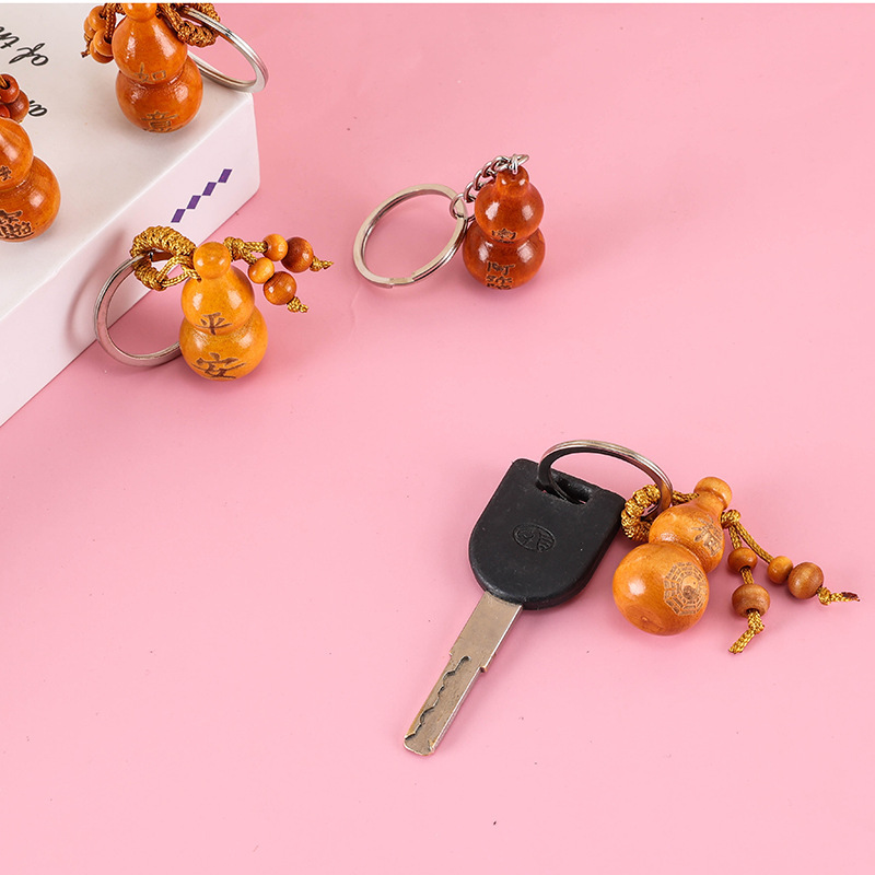 メーカー直売の桃の木のヒョウタンのキーホルダーの鍵を掛けて祝福の言葉を飾ります。|undefined