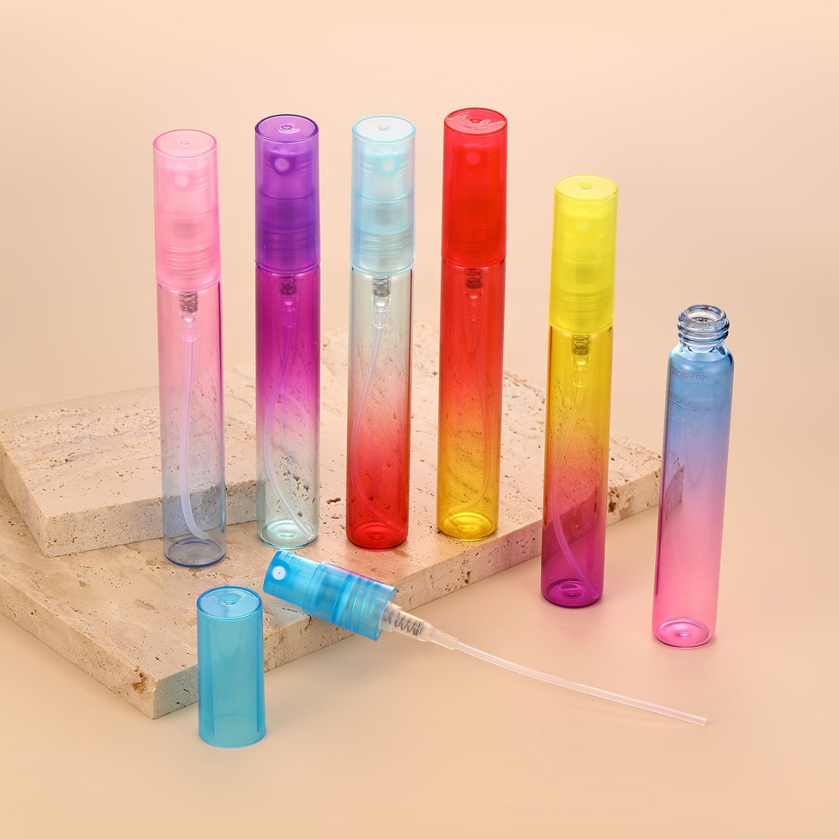 Botella de spray de vidrio delgado de 8ml con cabezal de bomba de presión Botella de tubo de tracción del arco iris Botella de subenvasada de cosméticos líquidos pequeños y portátiles