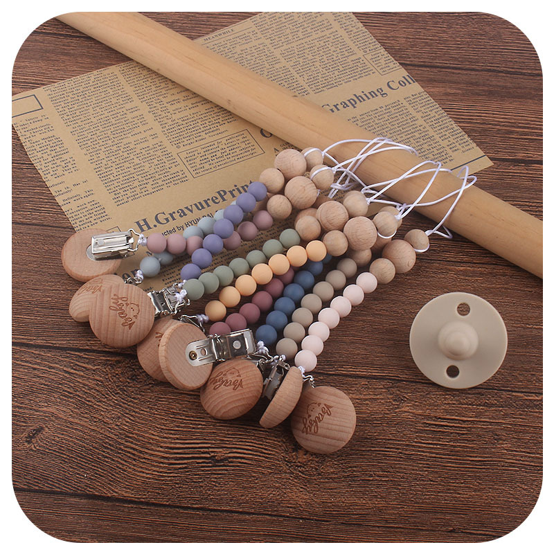 Bebé suministros de haya bebé Smiley cara forma chupete clip Beech cuentas de gel de sílice mordedor grano chupete cadena anti-pérdida