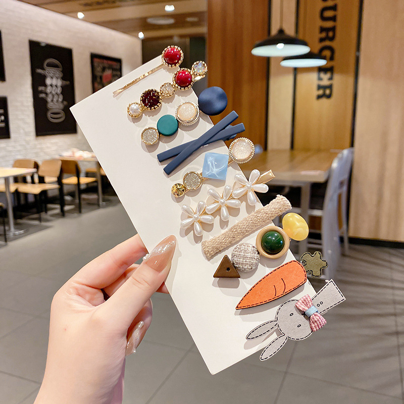 Clip de flequillo lateral rojo de la red femenina 2025 nueva horquilla simple clip de una línea horquilla clip de cabello roto tocado clip de pico de pato