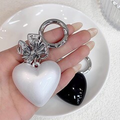 新しい絶妙でかわいいリボンラブカーバッグ携帯電話チェーンアクセサリーファッションペンダントペンダントキーホルダー