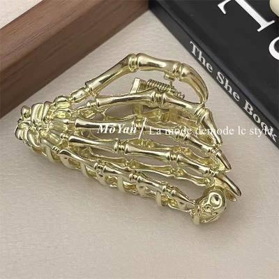 절묘한 황금 손 뼈 그리퍼