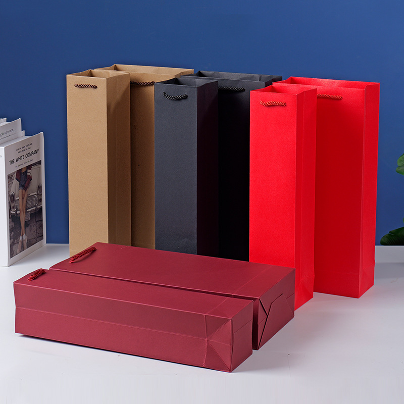 現物の高級ワインの手提げ袋は、シングルワインのギフト包装袋の紙袋を厚くしてロゴを印刷することができる