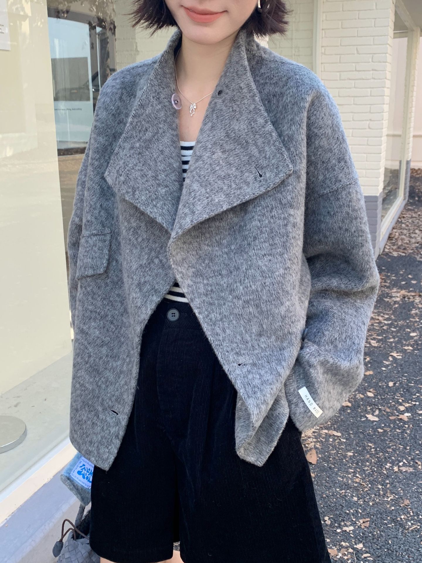 6801 韓国版インスタイルの個性的なデザイン、小柄な女性向けのゆったりとしたスタンドカラーウールコート、25年秋冬新作