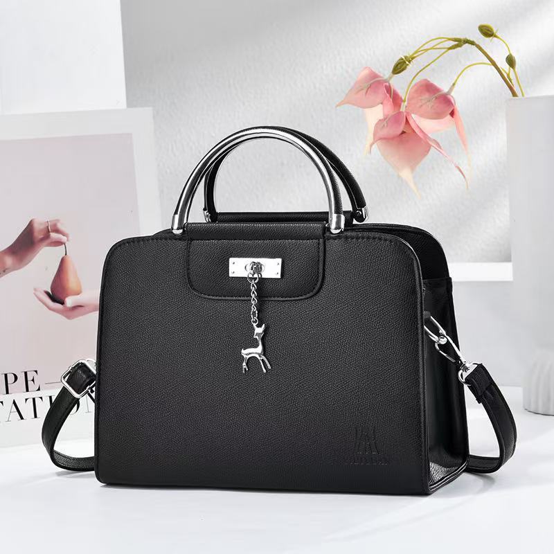 Nuevos ciervos colgantes bolsos de mano bolsos de hombro de moda casual diarios versátiles bolsos de transporte transfronterizos