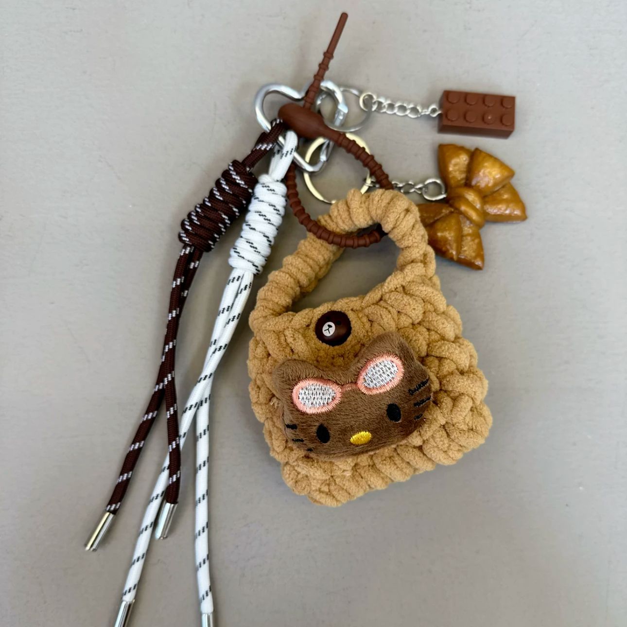 Black cat headphone bag bow bread pendant