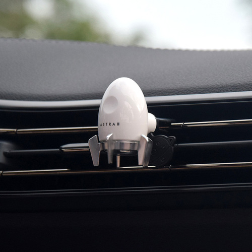 Small rocket car aromatherapy outlet with ambient light rotating new car ornaments perfume decoration solid balm