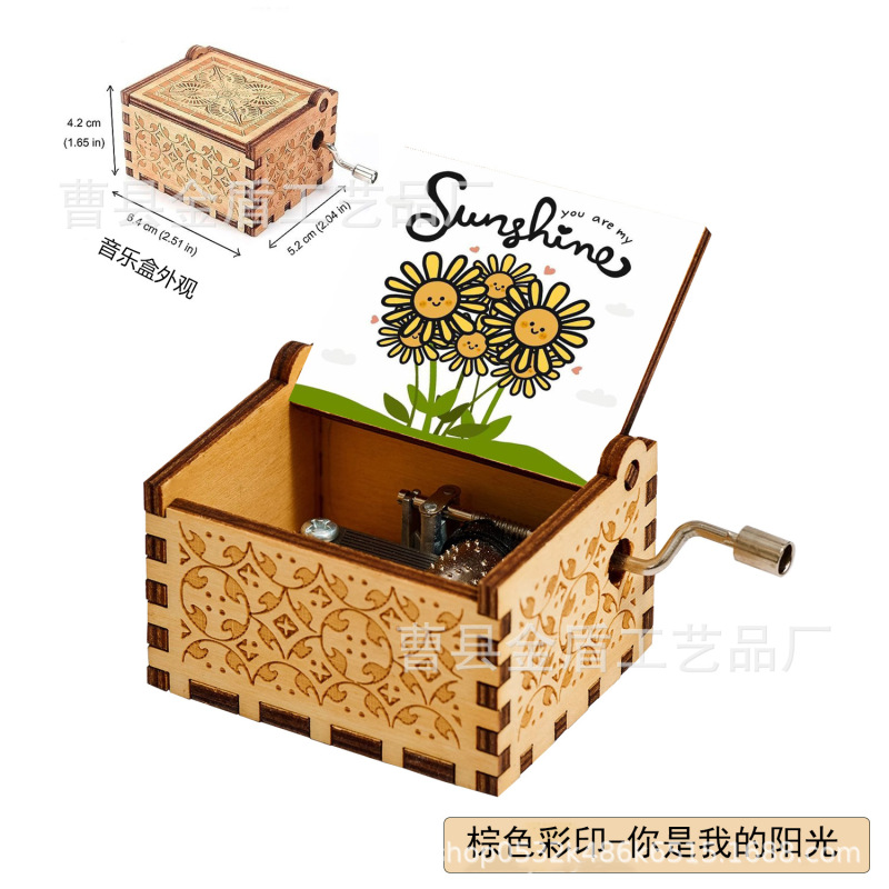 木製の手で音楽箱のアイデアを揺らします。|undefined