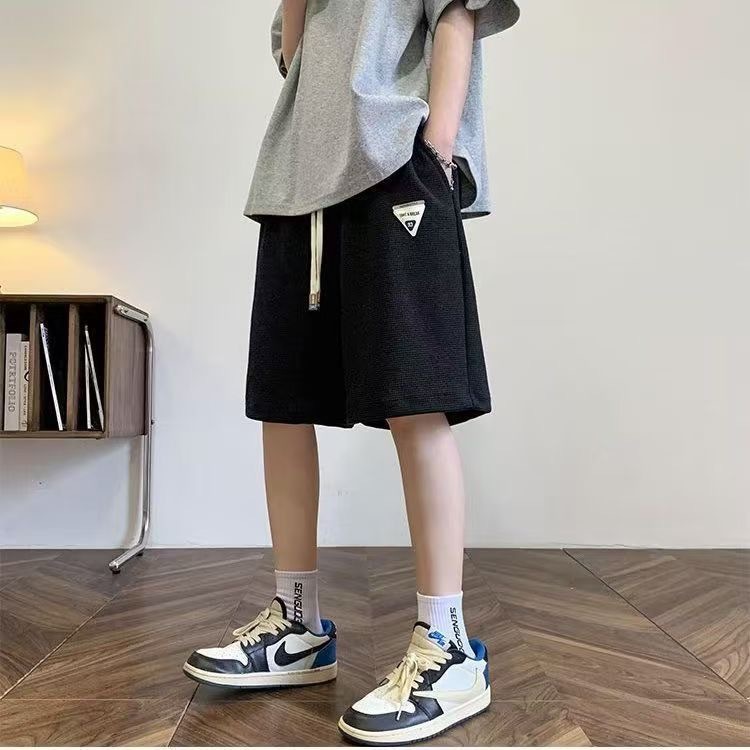 Diseño delgado nicho relajado de verano nuevo estilo americano pantalones cortos de moda hombre pantalones deportivos casuales de cinco puntos