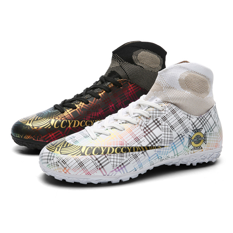 Venta al por mayor zapatos de fútbol resistente al desgaste transpirable Pato Mandarín color alto-top antideslizante Plaid casual corto clavo hierba juventud entrenamiento zapatos