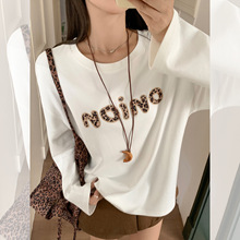 实拍2025秋季新款圆领长袖女宽松慵懒豹纹绣花撞色长袖小上衣女