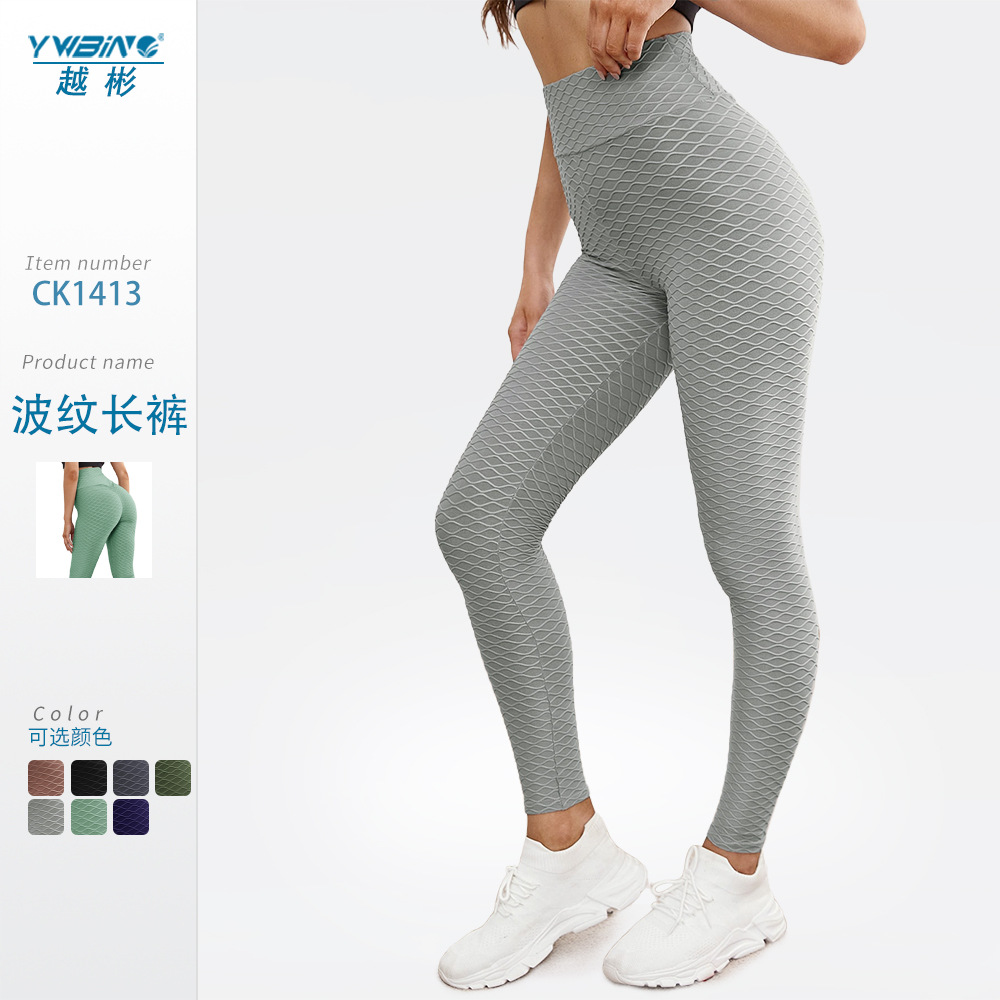 ¡En stock! Europa y América popular melocotón hip lifting onda patrón jacquard yoga burbuja pantalones de cintura alta medias deportivas para las mujeres