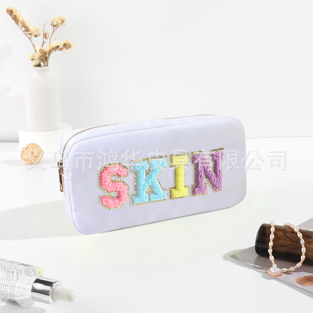 Transfronterizo amazon popular toalla bordada carta de nylon bolsa de cosméticos bolsa de almacenamiento de gran capacidad informal de las mujeres a prueba de agua