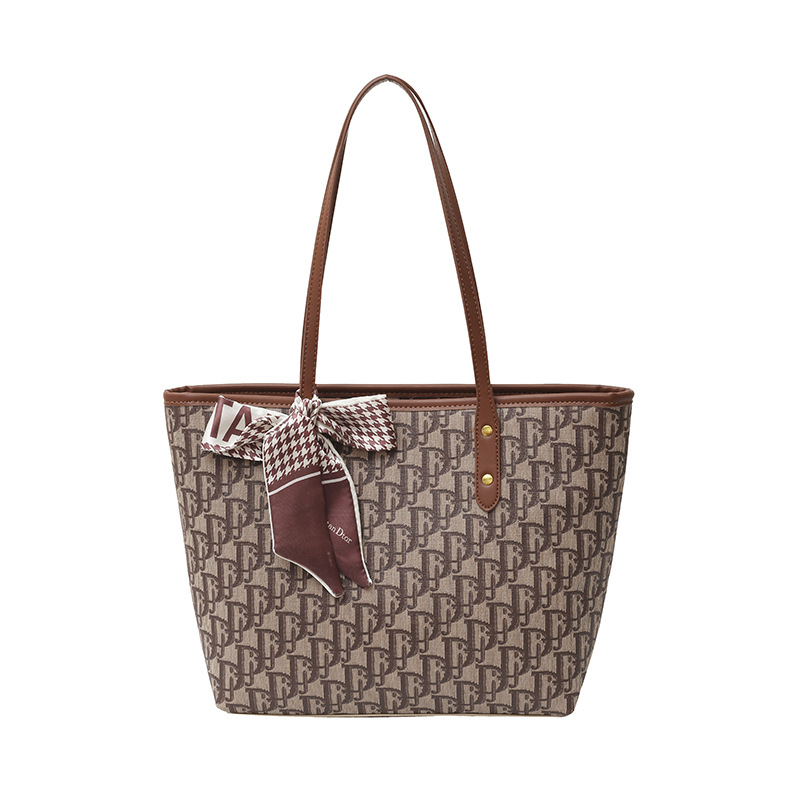 Bolso para mujeres 2025 nuevo retro alta textura versátil bolso de hombro impresa de gran capacidad de letras bolso de viaje