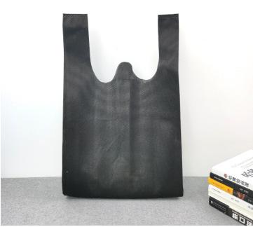 Bolsas de tela no tejida en stock bolsas de compras bolsas de chaleco impresión en color logotipo y patrón publicitario bolsas ecológicas