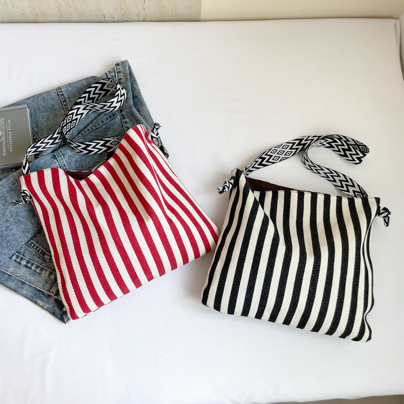 Bolsa de lona de hombro a rayas coreanas para mujeres 2025 nueva bolsa de mano de arte retro gran capacidad bolsa de viaje de moda