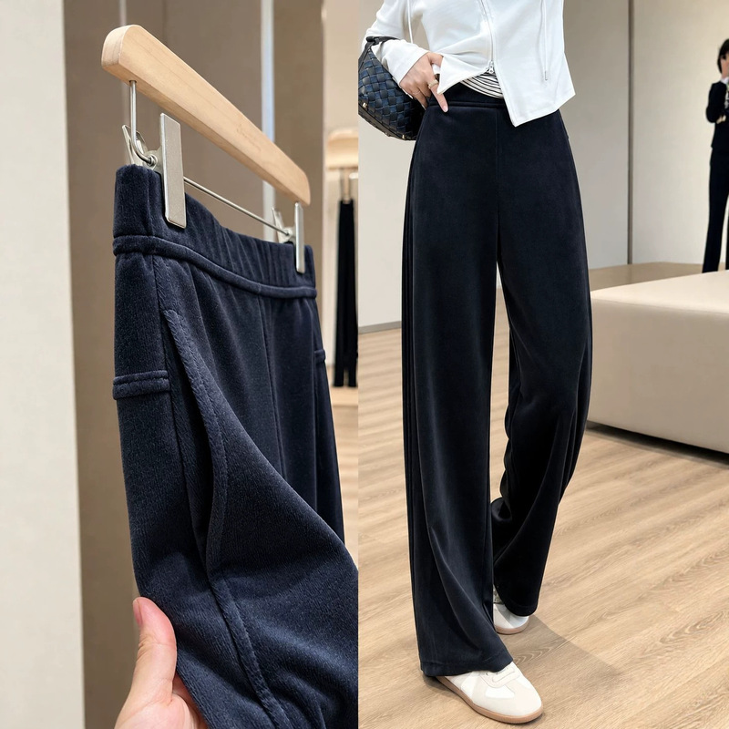 Elegant and versatile, these soft, textured velvet pants with a slim fit and a flattering drape are perfect for work or casual wear, creating a slimming and stylish look for autumn Elegant and versatile, these soft, textured velvet pants with a slim fit and a flattering drape are perfect for work or casual wear, creating a slimming and stylish look for autumn