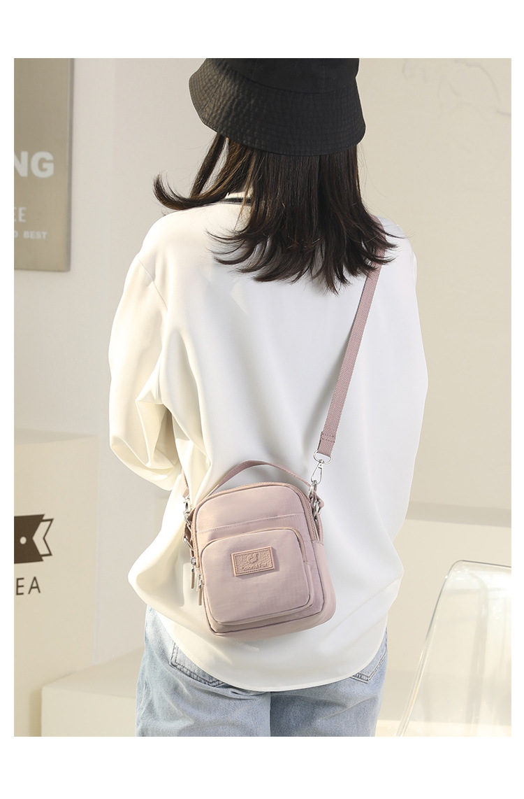 2025 New fashionable and trendy single-shoulder bag for women, outdoor casual, mobile phone key, coin purse, water-resistant nylon bag undefined