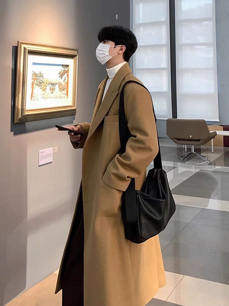 冬の新型の毛はコートの男性の中で長いタイプはひざを過ぎてカシミヤのラシャの風衣の男性のコートの韓国版がゆったりとしています。