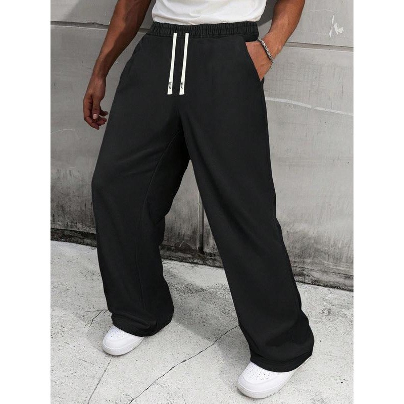 Pantalon de survêtement homme uni à jambes larges, coupe ample et décontractée, cordon de serrage, style sportif, jambes droites._voghion.com