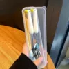 Spoon, fork, chopsticks, box
