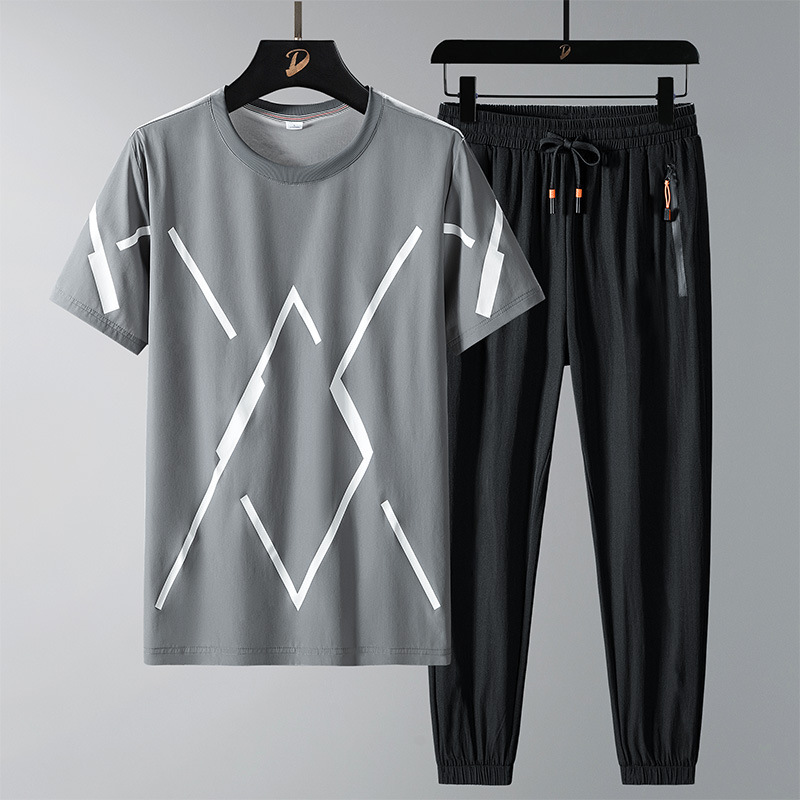 Gran tamaño de ropa de hombre de verano traje deportivo casual hombre camiseta de cuello redondo impresión de tendencia de dos pantalones largos