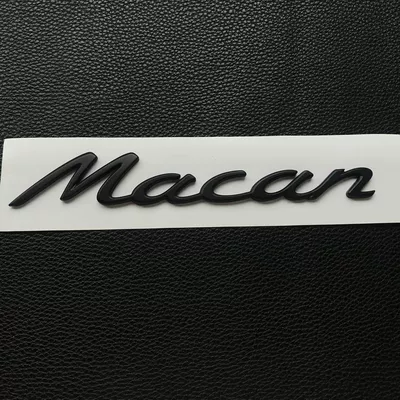 the rear trunk of a – Car logo - standard-macan