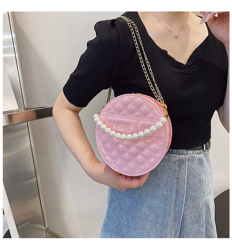 Fashion Solid Color Embossed Pearl Handle Small Round Bag display picture 5