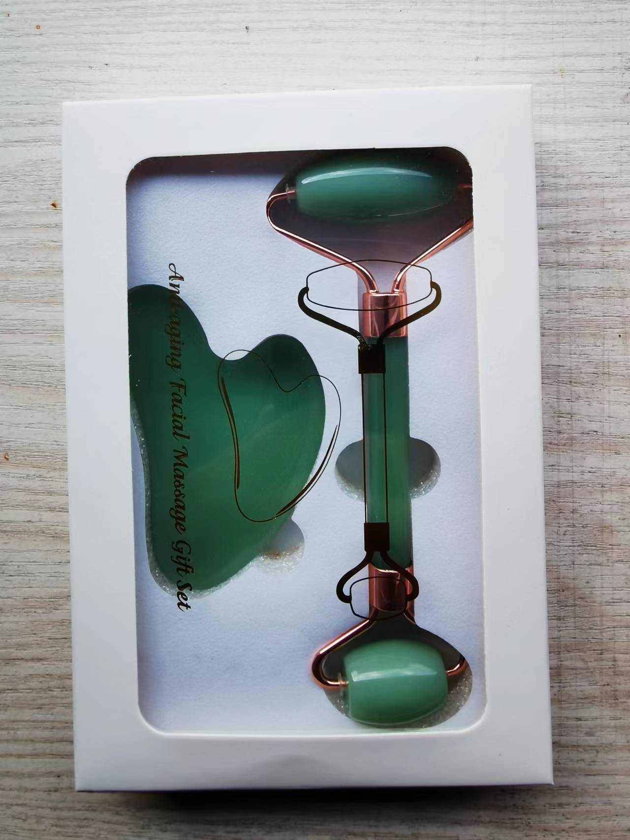 Caja de regalo de masaje facial de rueda de jade natural para masaje de placa de masaje de rueda de jade de suministro directo