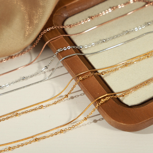 Minimalist style niche elegant temperament personalized jewelry bead chain snake bone chain double stacking style titanium steel gold-plated bracelet