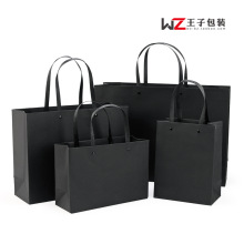 铆钉黑卡纸纸袋现货黑色礼品袋手提袋印刷高档服装店购物袋子批发
