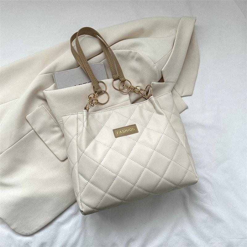 Bolso de gran capacidad de ocio para mujeres 2023 primavera nueva simple estilo extranjero de transporte de mochila de moda textura tote