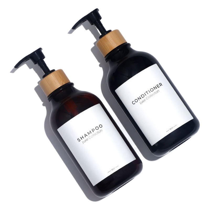 En stock suministro 500mlPET prensa redonda hombro plástico champú botella baño crema botella vacía cosmética sub-botella